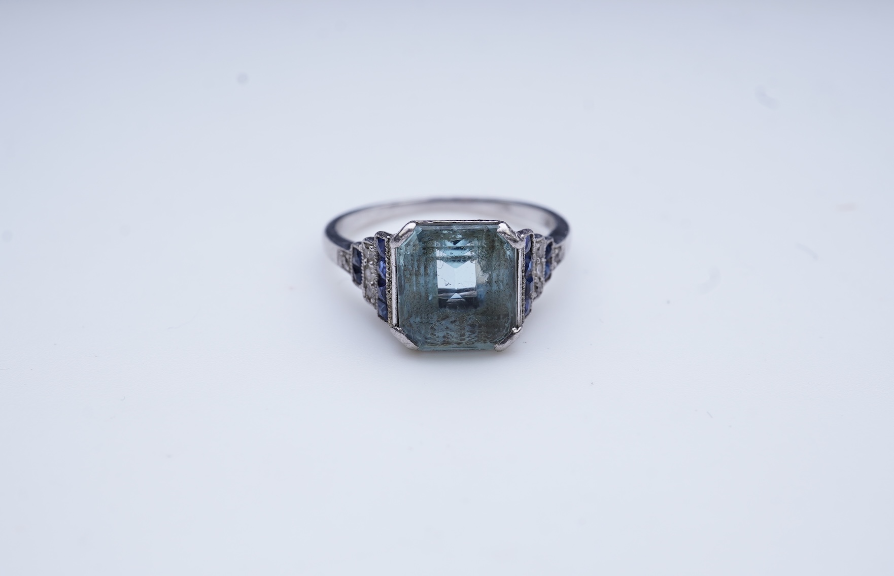 An aquamarine, sapphire and diamond ring